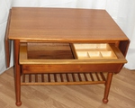 mid 20 century Danish occasional table with under-trough