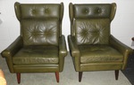 mid 20 century Stouby wing back leather chairs