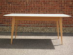 Mid 20 century dining table with glass top