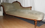 Victorian Chaise Longue covered in a pastel green velvet material 