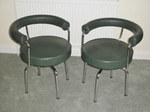 Pair of Charlotte Perriand - LC7 Swivel Armchairs