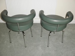 Pair of Charlotte Perriand - LC7 Swivel Armchairs