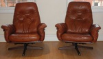 Pair of Swedish Göte Mǿbler leather Swivel/Reclining Chairs  
