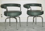 Pair of Charlotte Perriand - LC7 Swivel Armchairs